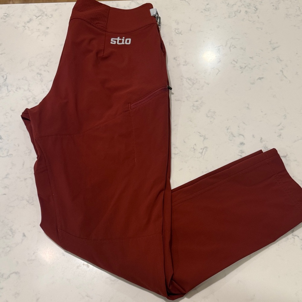 STIO Women’s OPR Deep Orange Rust Performance Pants Biking Hiking Outdoor Size 8